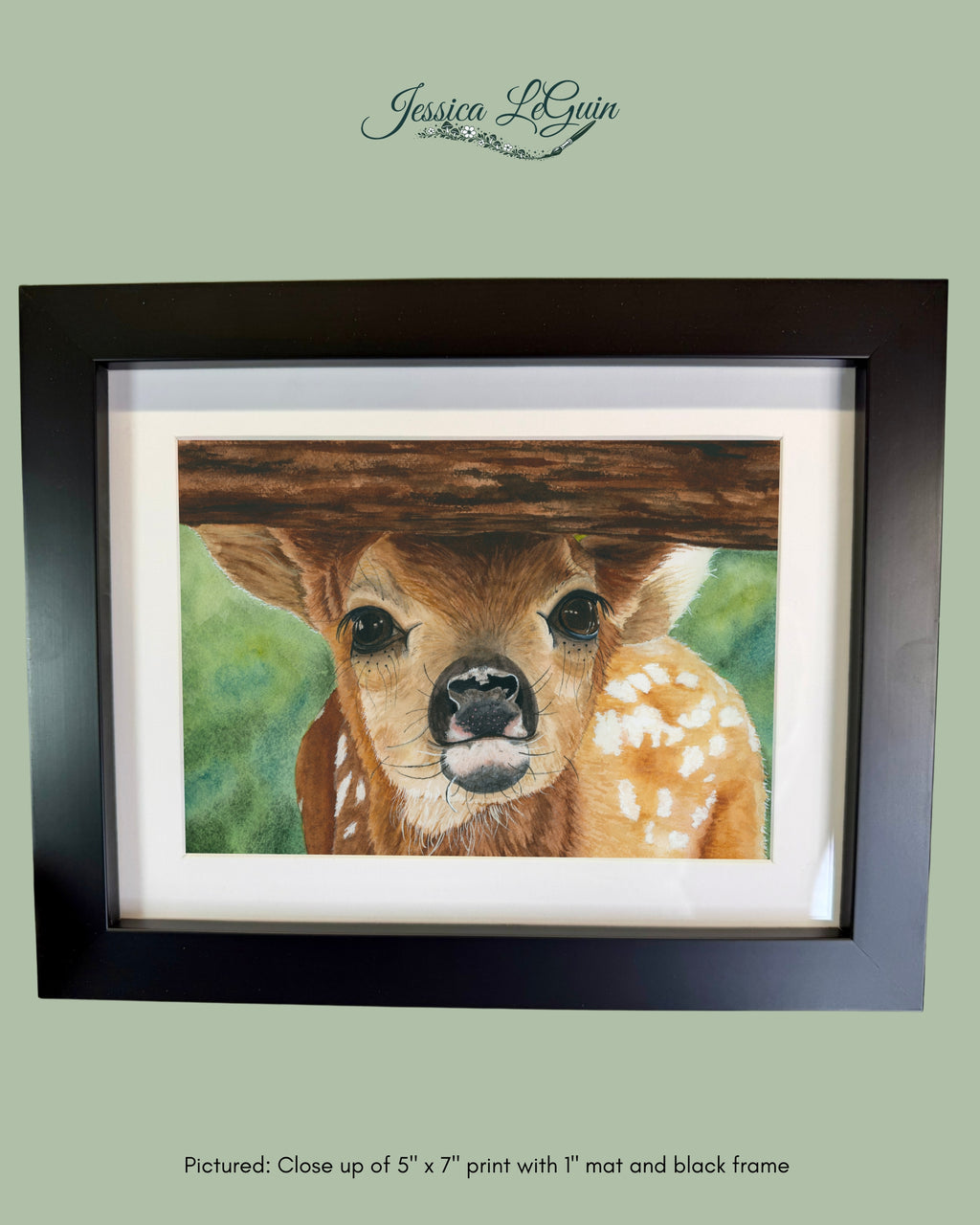 Baby Deer Peeking Under Fence Framed Print